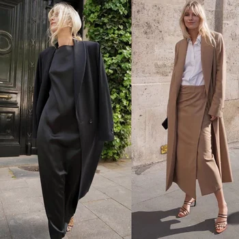 INS blogger'ın modaya uygun ve zarif stili, hafif, ince ve pürüzsüz çizgileri, sarkık siyah yün paltosu ve kadınlar için paltosu ile